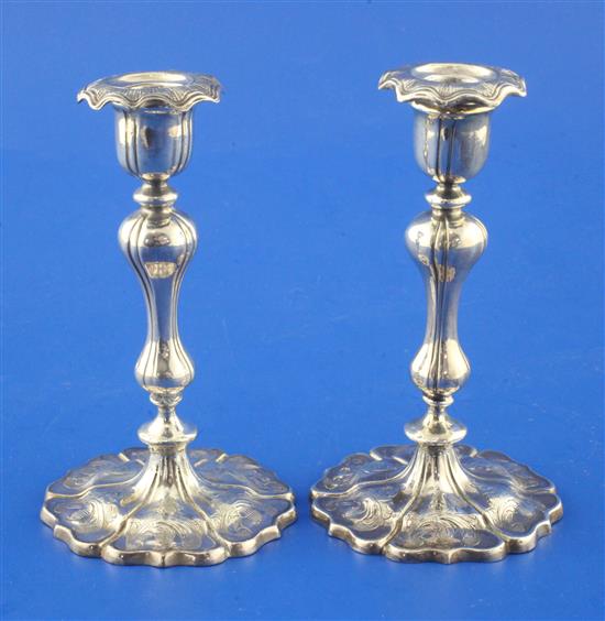 A pair of Victorian silver tapersticks by Hawksworth, Eyre & Co, 4 oz.
